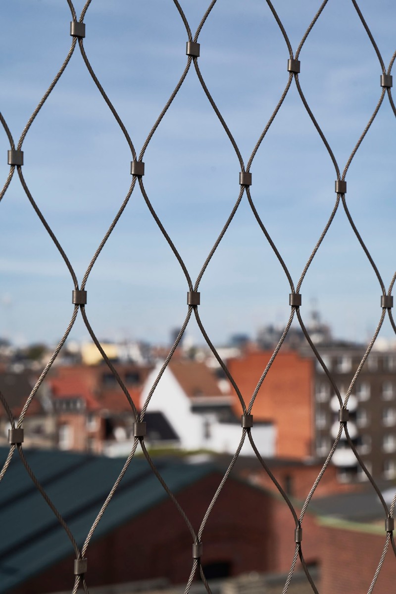 Application and Advantages of Stainless Steel Wire Rope Net in Building Safety Protection